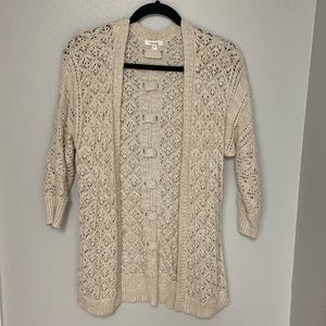 Cream or off white colored cardigan